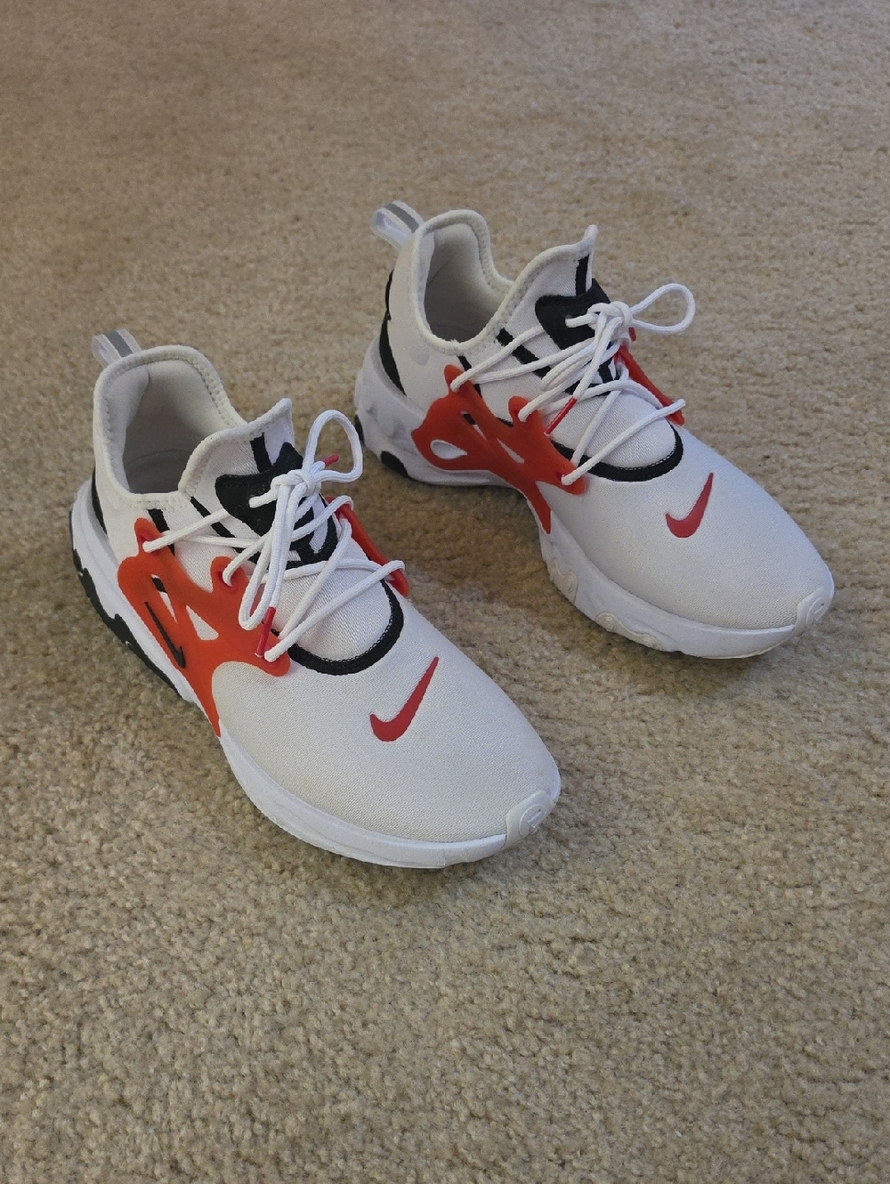 Nike Men's White Sneakers with Red and Black Accents